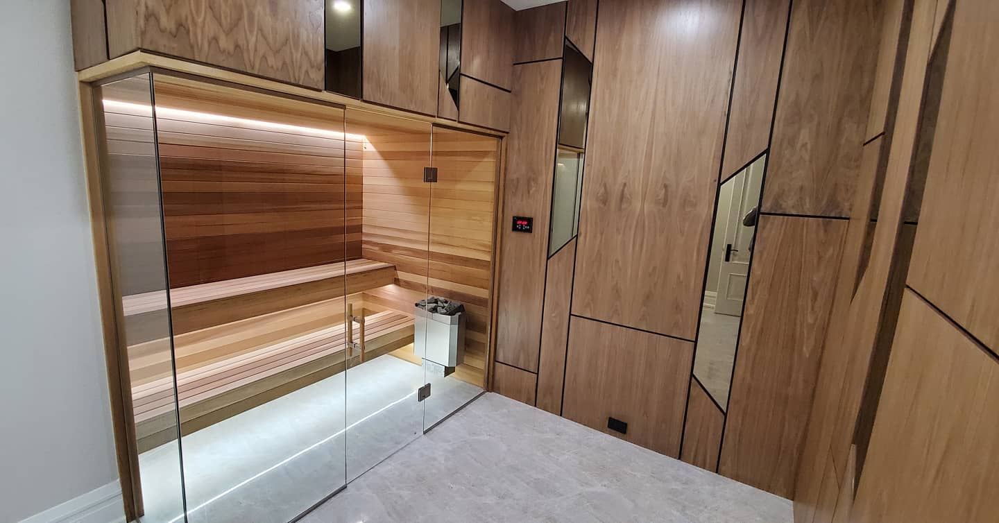 sauna with wooden panel walls